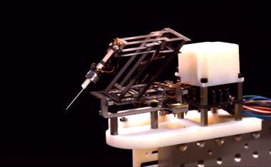 Origami-inspired miniature manipulator for microsurgery