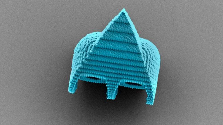 扫描电子显微镜图像显示了一个细胞大小的机器人游泳者